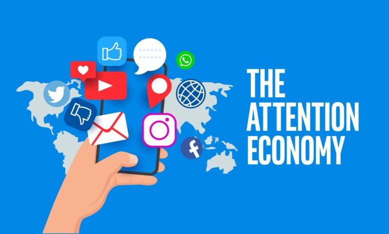 Hand holding a smartphone with floating social media icons