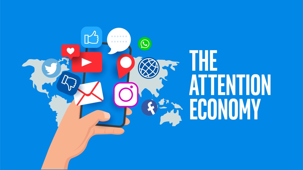Hand holding a smartphone with floating social media icons
