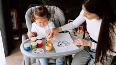 a woman taking care of a baby