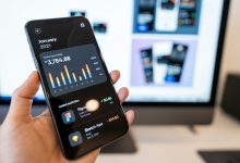 Phone displaying a personal spending app with latest activities using ai for credit analysis.